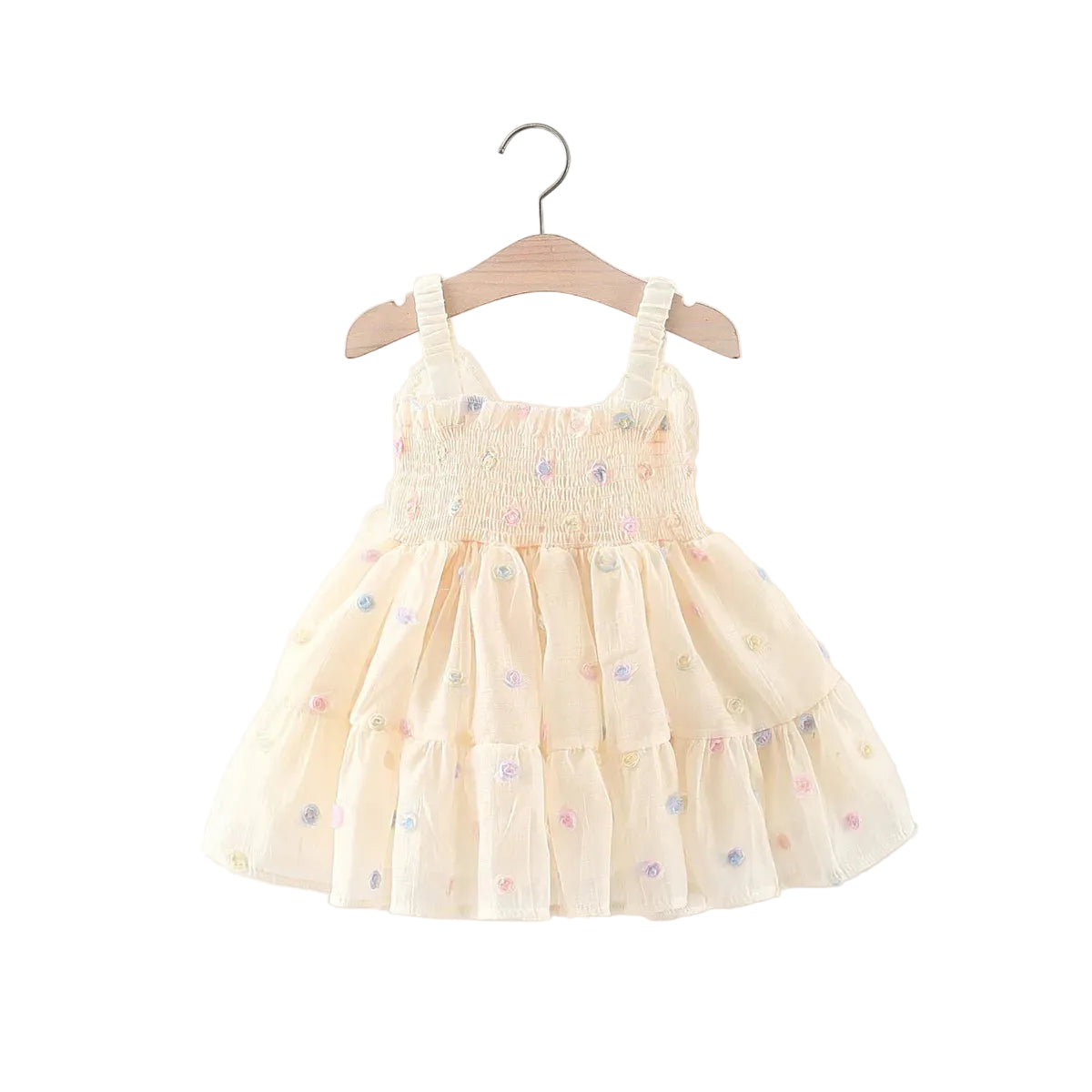 Isolated front view of the sleeveless cream baby girl fairy dress hanging cleanly on a wooden hanger against a solid white background.