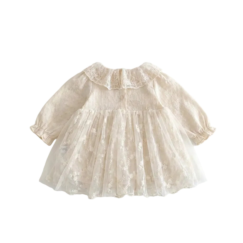 Back view of the vintage-inspired cream baby girl lace dress on a white background, highlighting the single button neckline closure, elastic ruffled sleeve cuffs, and floral embroidered tulle skirt.