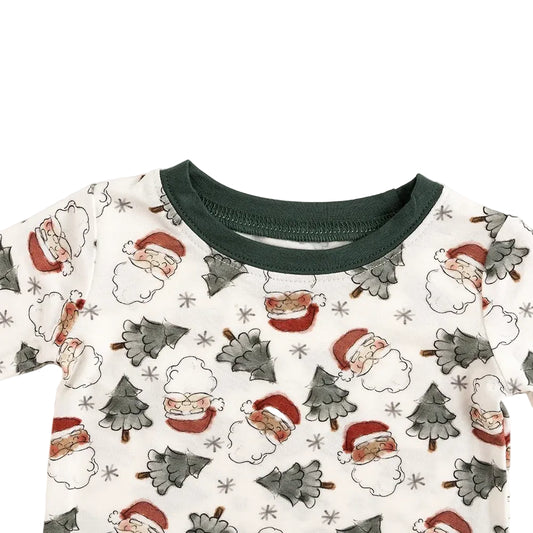 Close-up detail of forest green crewneck collar and tagless interior on Kidsely Vintage Santa bamboo toddler pajama top