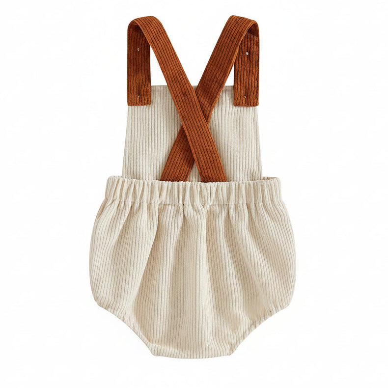 Back view of the beige baby corduroy bubble romper showing the criss-cross design of the brown shoulder straps.