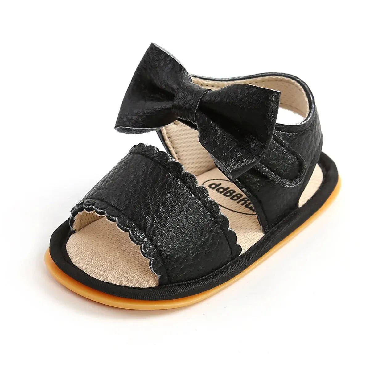 Profile view of a single black leather infant girl walking sandal highlighting the secure ankle support fit and textured upper material.