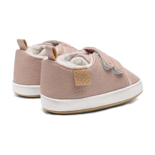 Back and side view of pink baby winter sneakers showing the contrast heel patch and convenient pull tab.