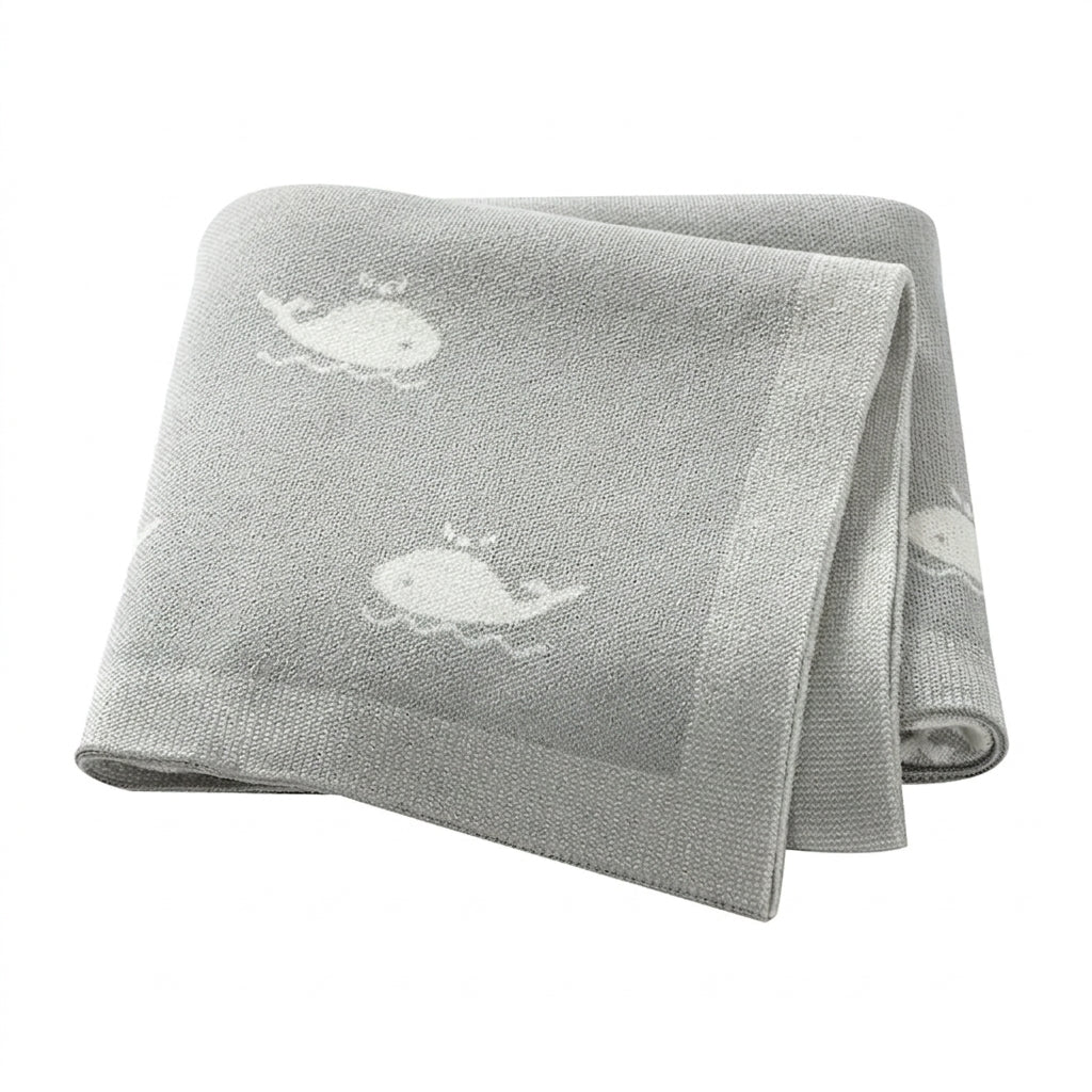 Kidsely soft knit baby blanket in gender neutral grey with white whale pattern