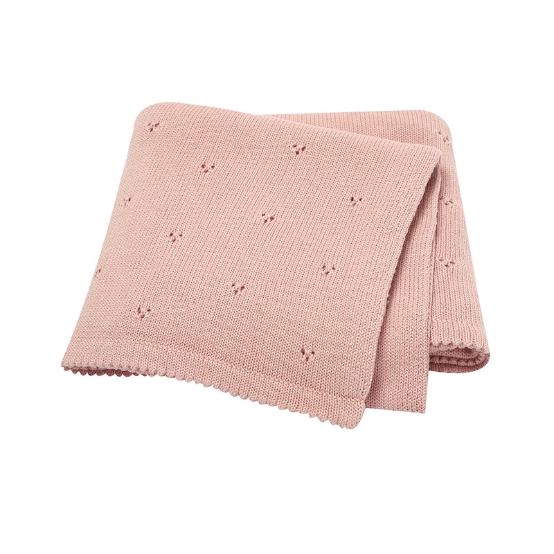 Soft Dusty Rose 100% cotton knit baby blanket with a delicate pointelle weave for newborns.