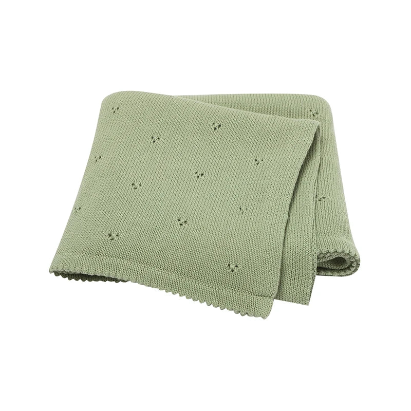 100% cotton knit baby blanket in Sage Green featuring a breathable pointelle cellular pattern.