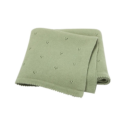 100% cotton knit baby blanket in Sage Green featuring a breathable pointelle cellular pattern.