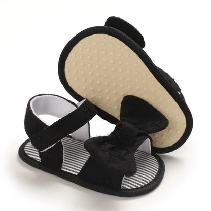 kidsely-baby-wearing-black-bow-sandals