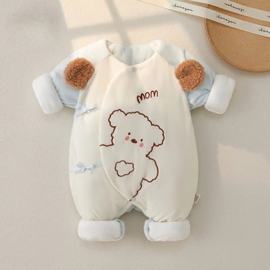 Quilted polyester baby kimono romper in cream and blue with 3D bear ears and snap bottom closure.