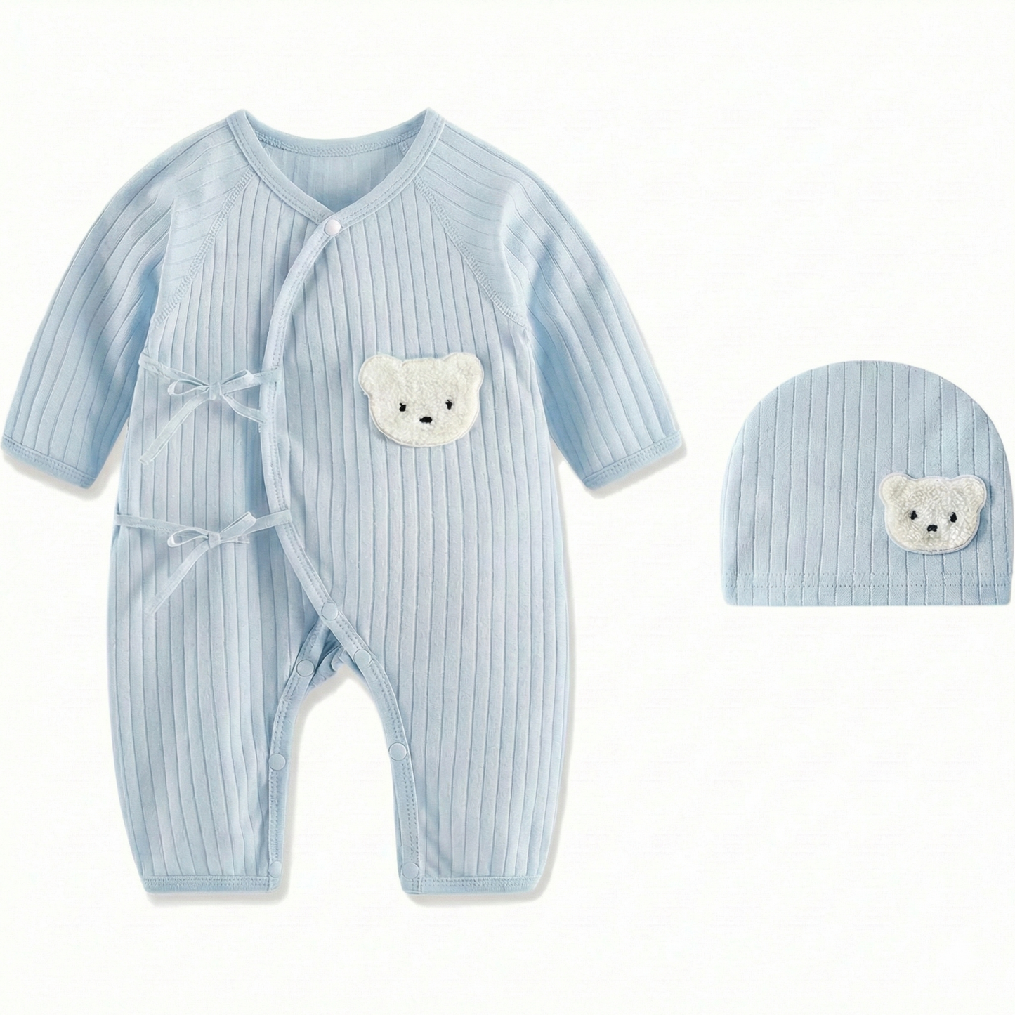 Light blue long sleeve ribbed cotton romper for baby boys with matching beanie hat and white bear design.