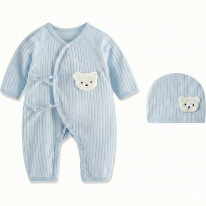 Light blue long sleeve ribbed cotton romper for baby boys with matching beanie hat and white bear design.