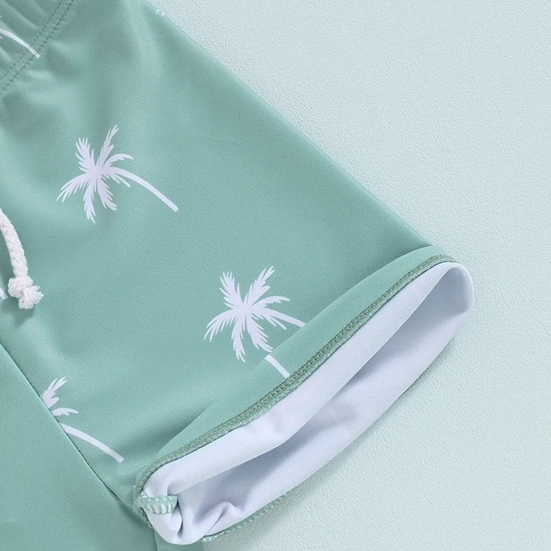 Dinosaur & Palm Tree Swim Trunks | Quick-Dry Board Shorts | Teal & Ivory White | (6M-4T)