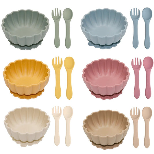 3-piece silicone feeding set showing a round suction bowl with a matching silicone fork and spoon.