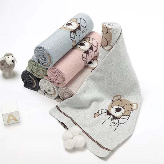 Set of baby blankets with teddy bear designs on a white background