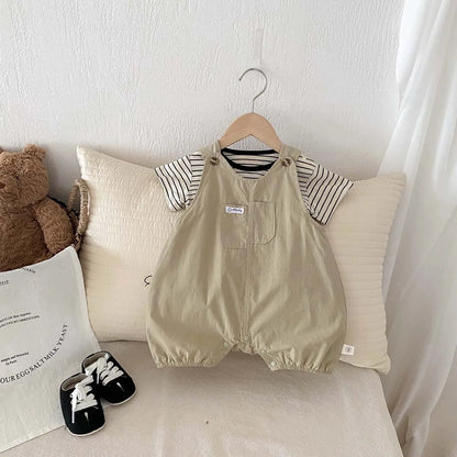 Flat lay of 2-piece baby boy summer outfit featuring Hamptons Beige overalls with front pocket and black and white striped short sleeve t-shirt.