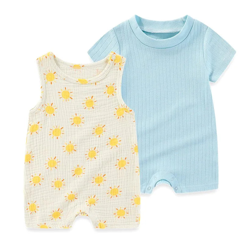 Newborn boy 2-pack including a solid sky blue ribbed short-sleeve romper and a cream sleeveless muslin-style romper with yellow sun prints.