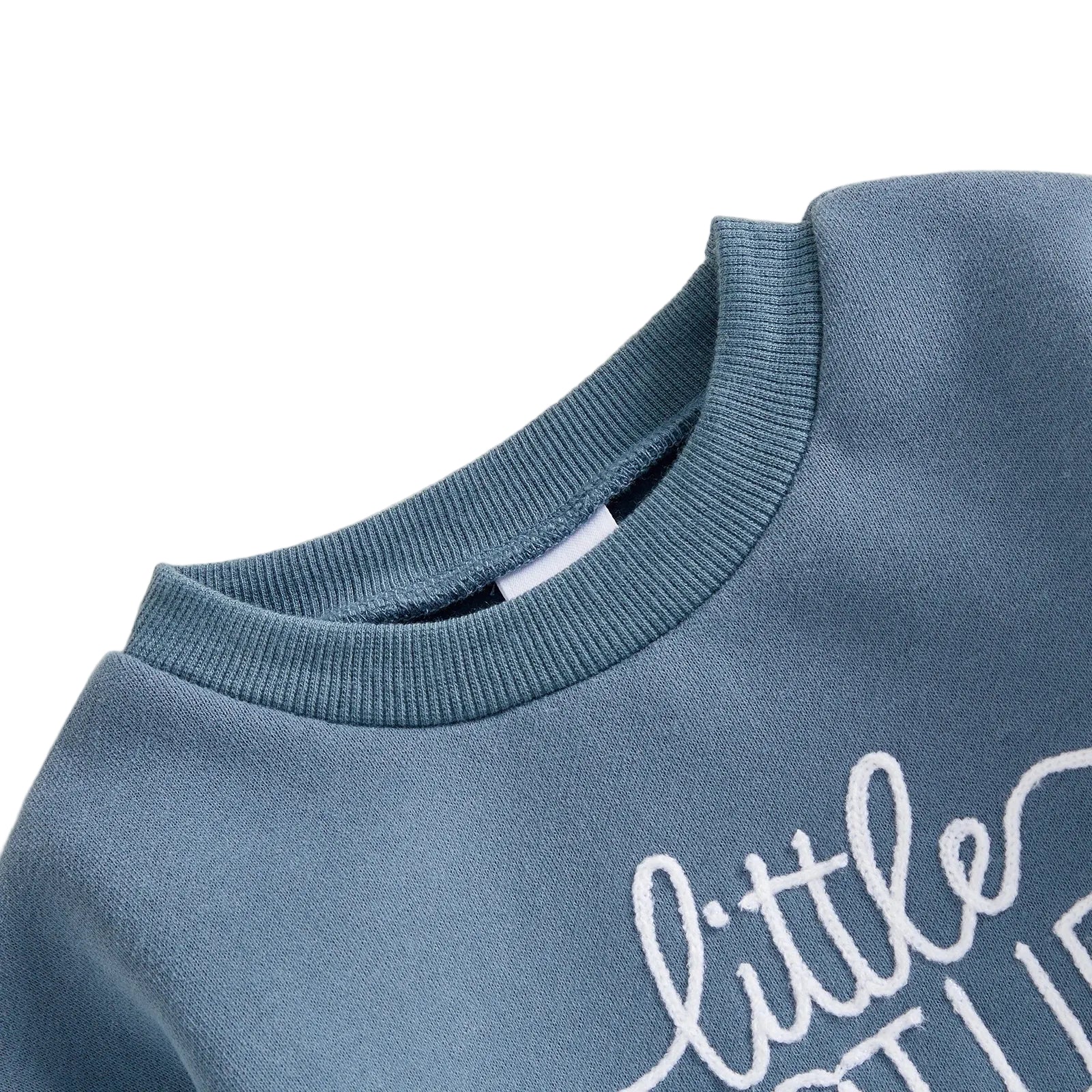 Close-up detail of the ribbed crewneck collar and white embroidery on the blue fleece baby romper.