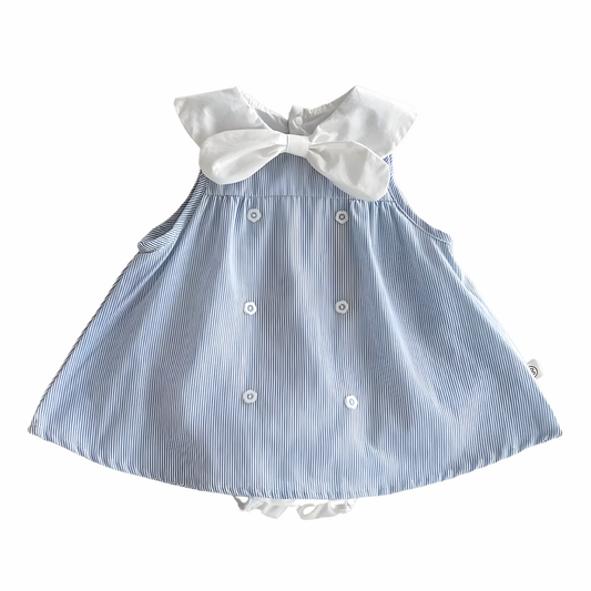 Blue and white nautical striped dress with a large sailor bow on a white background