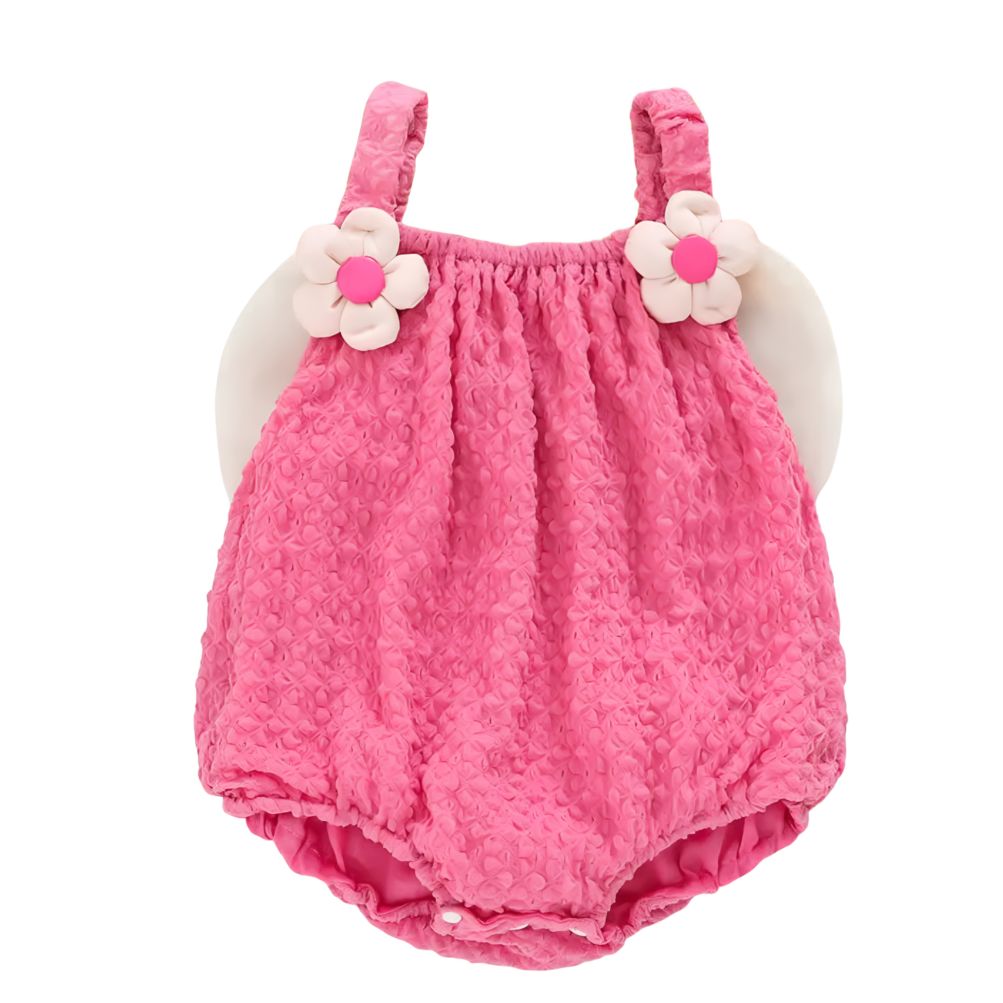 Pink sleeveless baby girl bodysuit featuring textured fabric and white 3D flower decorations on the shoulders.