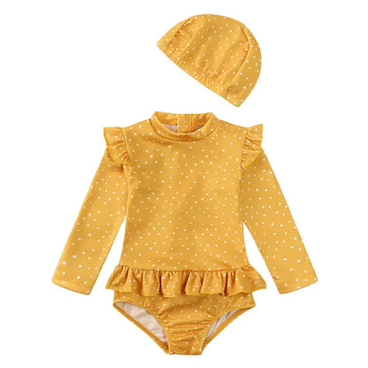 Mustard yellow Golden Honey Polka dot long sleeve swimsuit for toddler girls with matching sun cap.
