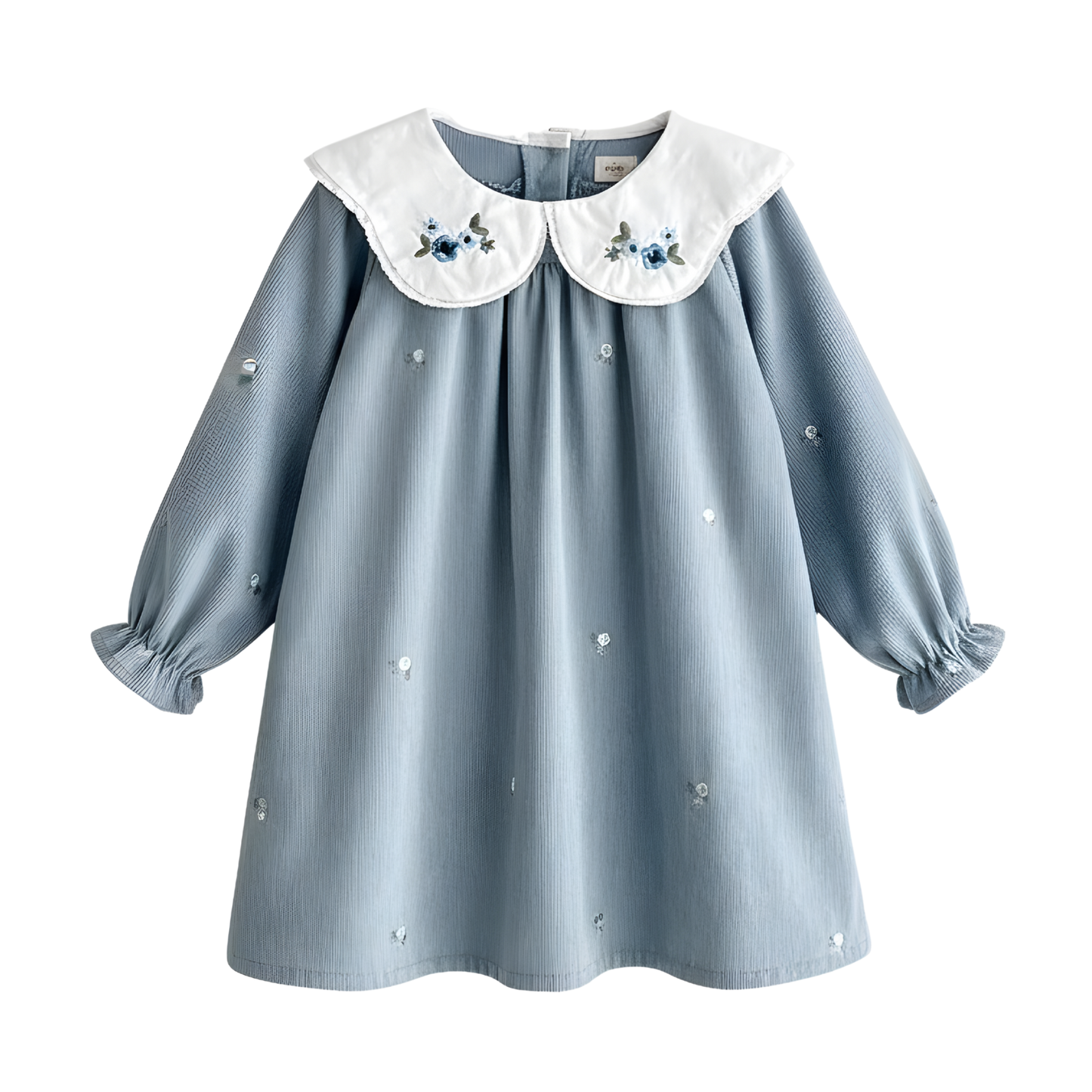 Flat lay of a cottagecore vintage style light blue corduroy A-line Princess Dress with white floral embroidered collars.