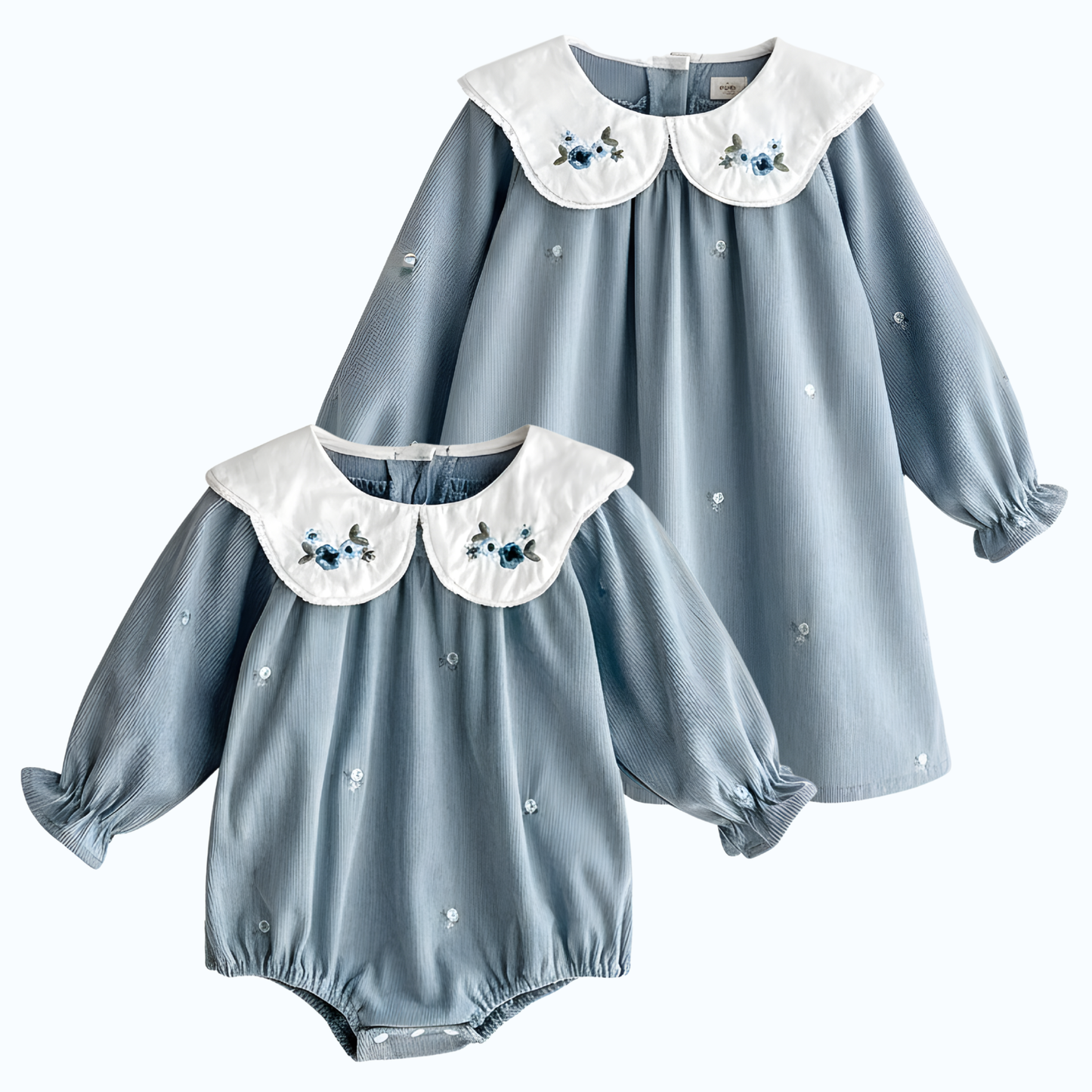 Flat lay of matching sister outfits featuring a light blue corduroy baby romper and toddler girl princess dress with white floral embroidered collars.