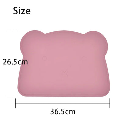 Pink cushion with dimensions labeled on a white background