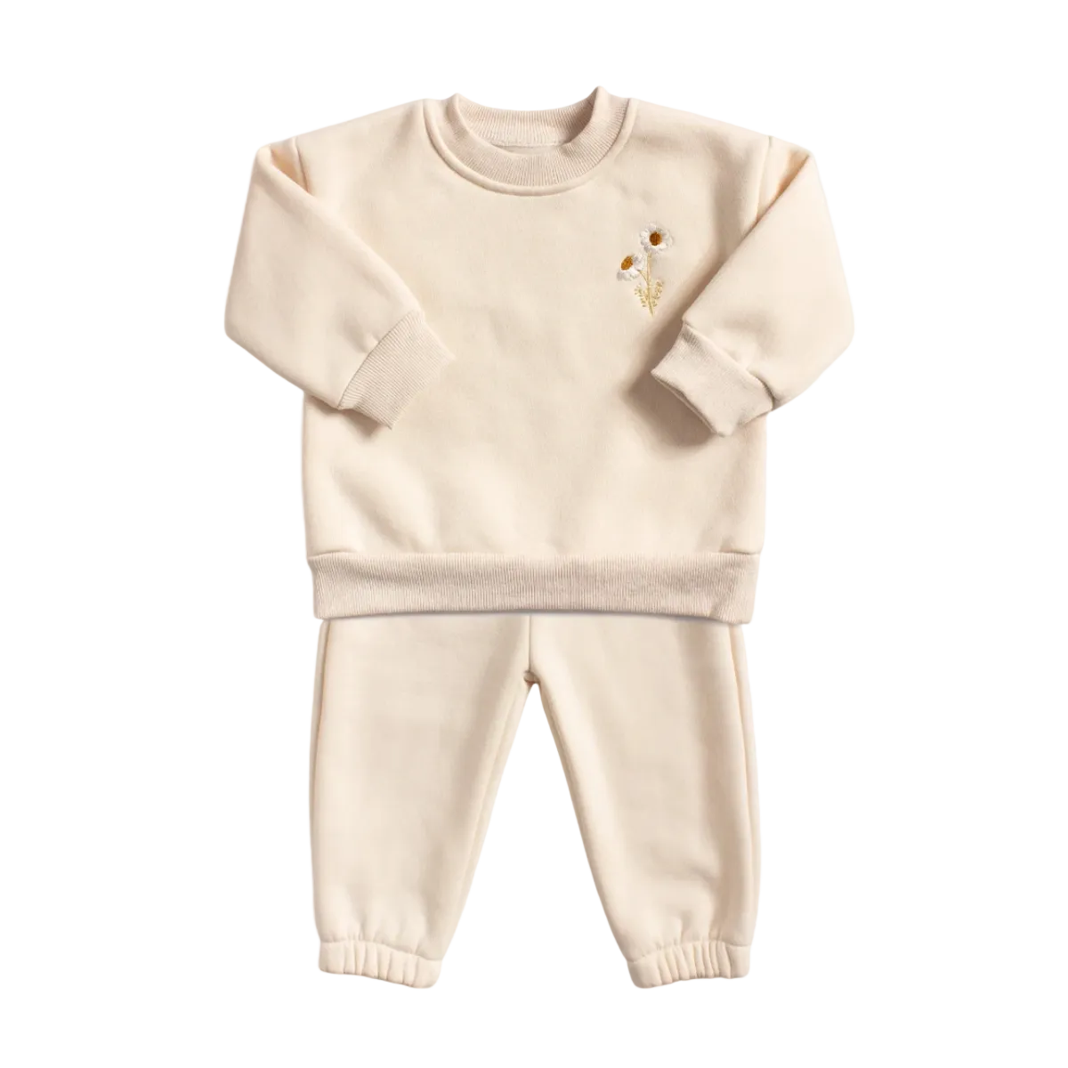 Flat lay of a cream two-piece baby lounge set, showing a crewneck sweatshirt with small daisy embroidery on the left chest and matching jogger pants