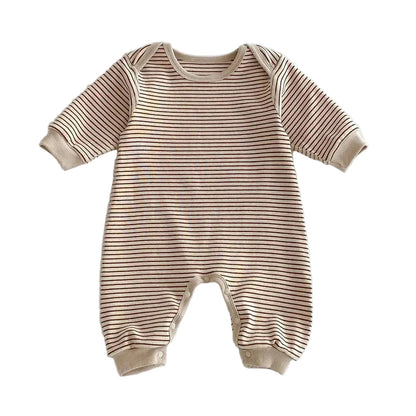 Front view of the neutral striped baby romper in Toasted Latte featuring a beige base with warm brown stripes.