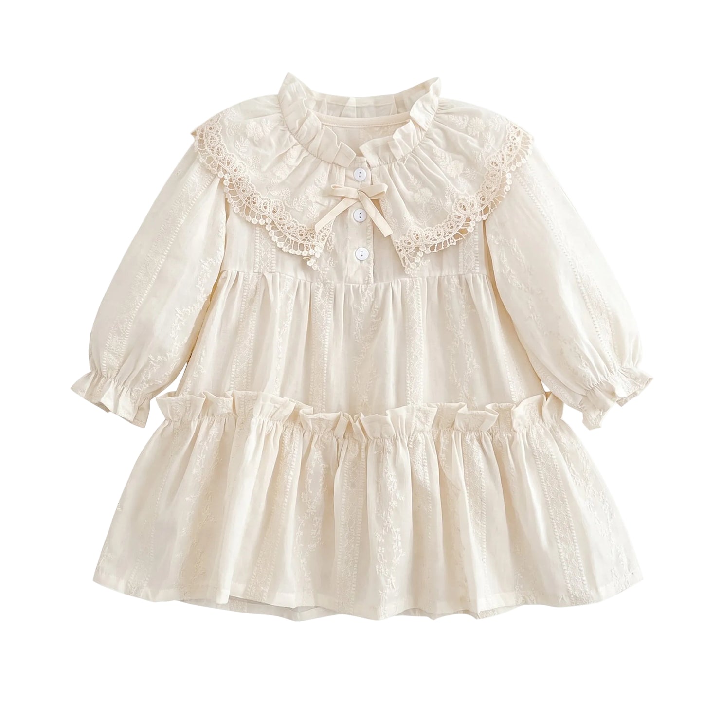 Off-white vintage toddler and girls long sleeve tiered dress featuring an oversized lace Peter Pan collar, bishop sleeves, and front bow detail.