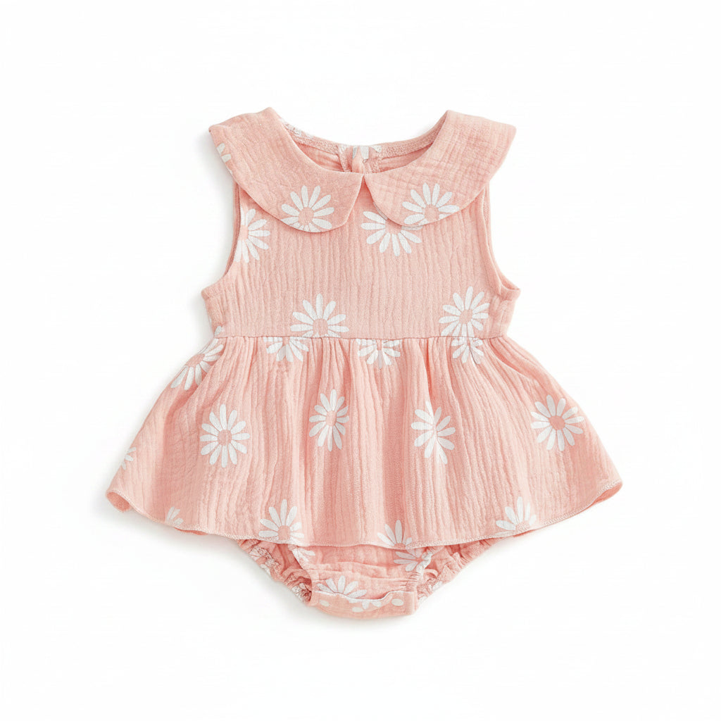 Newborn and infant baby girl pink floral jumpsuit with white daisy print and doll collar detailing.