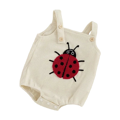 Front view of the Little Ladybug sleeveless romper in cream ribbed corduroy with ladybug embroidery.