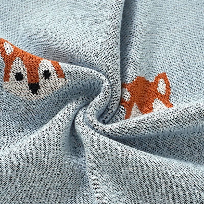 Soft twisted fabric close-up showing breathable cotton knit texture on fox baby blanket
