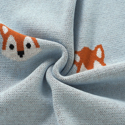 Soft twisted fabric close-up showing breathable cotton knit texture on fox baby blanket