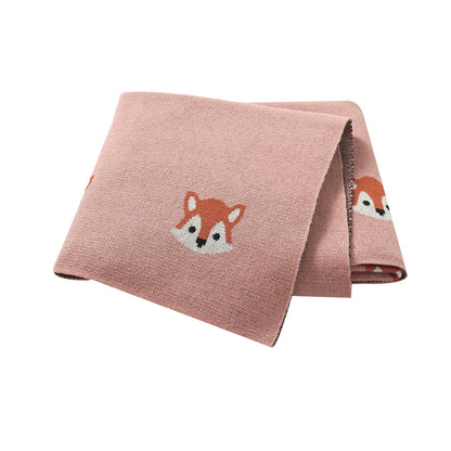 Pink 100% cotton soft knit baby receiving blanket with fox pattern folded on white background