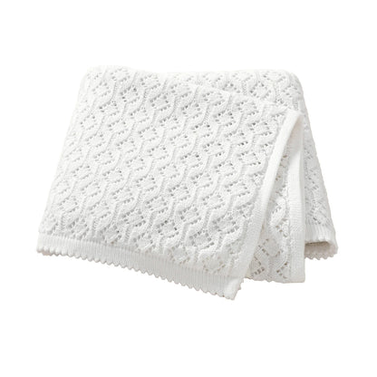 White 100% cotton soft knit baby receiving blanket folded on white background