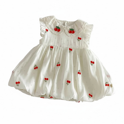 Front view of the antique cream bubble dress for baby girls featuring an all-over cherry embroidery pattern.