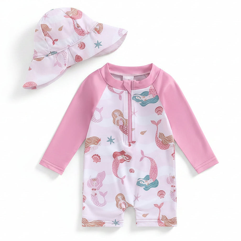 Baby girl mermaid print long sleeve rash guard swimsuit in pink with matching wide-brim neck flap sun hat, infant and toddler sizes 3M to 3T, isolated on a white background.