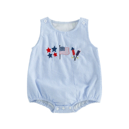 Front view of the baby boy 4th of July blue striped bubble romper with patriotic star, flag, and firecracker embroidery.