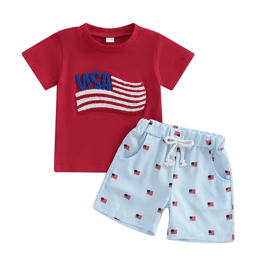 Baby boy 4th of July outfit 2-piece set featuring a red USA flag embroidered shirt and light blue striped flag print shorts.