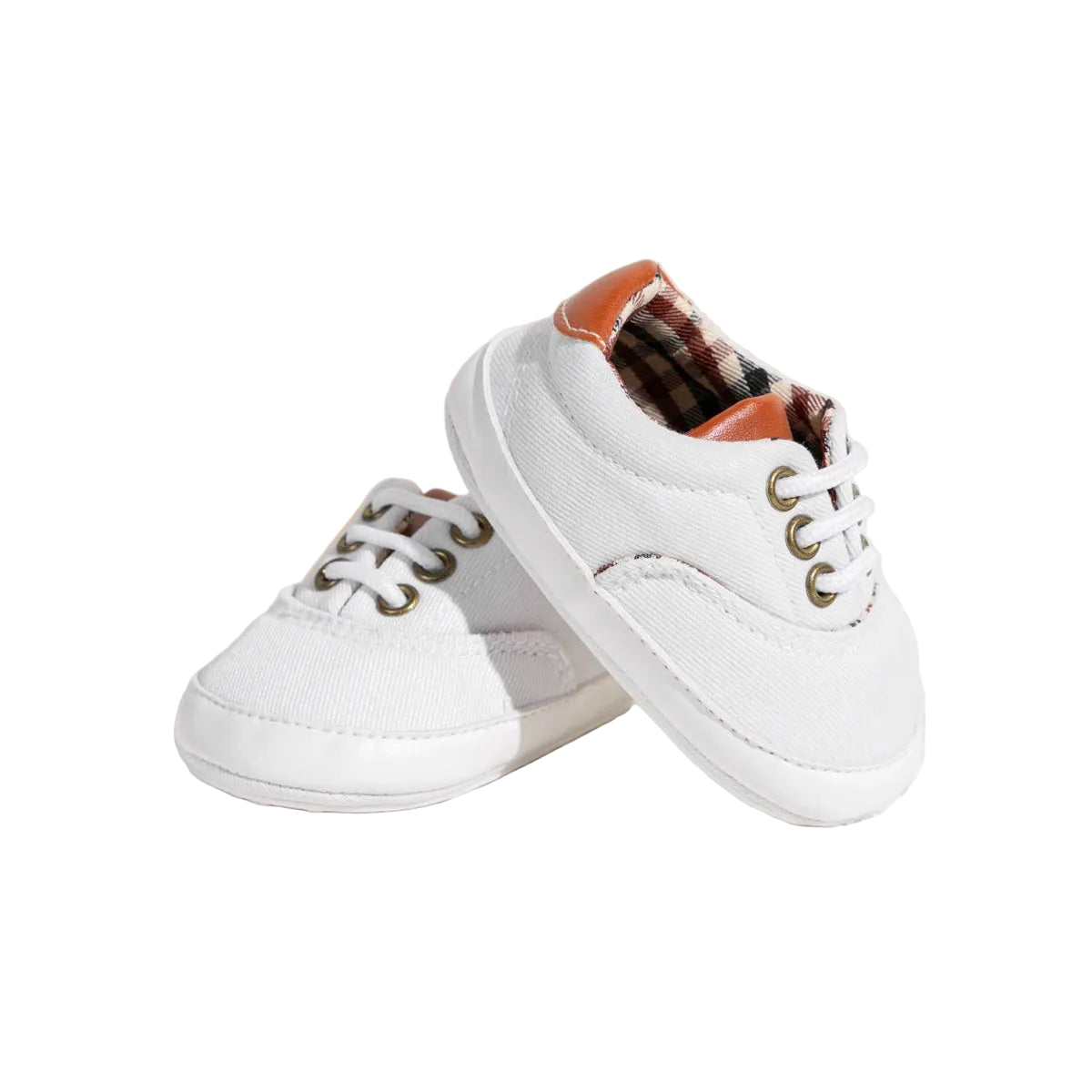 White sneakers with plaid accents on on a white background.