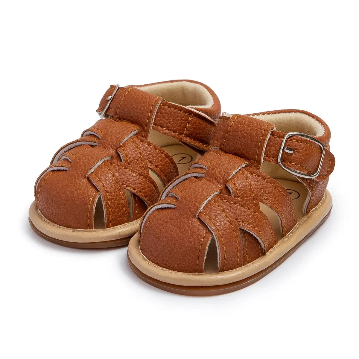Pair of brown faux leather baby boy fisherman sandals side-by-side showcasing the classic closed-toe cage design.