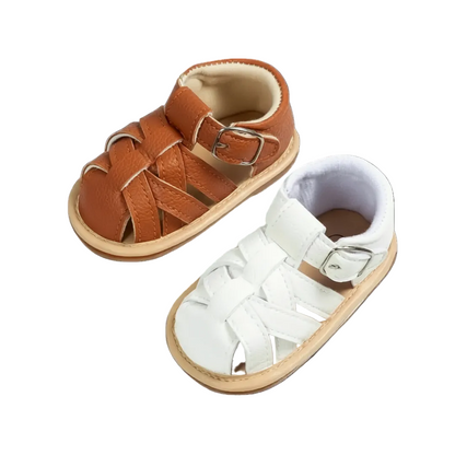A pair of kidsely baby boy fisherman sandals displayed together in brown and white on a clean white background.