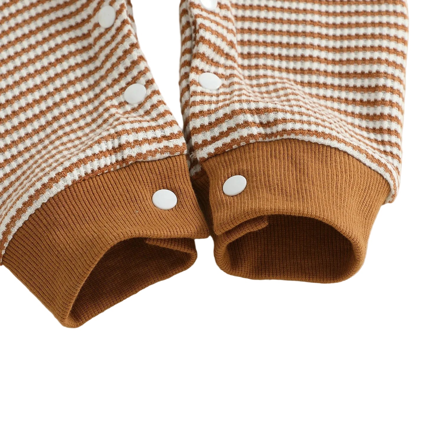 Close up of the convenient crotch snap buttons open for easy outfit and diaper changes on the baby football jumpsuit.