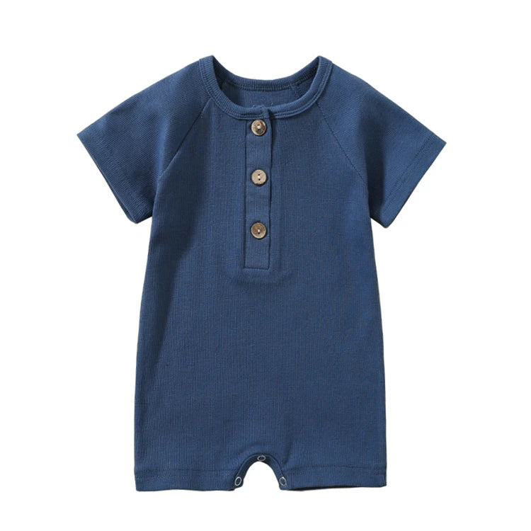 Baby boy ribbed henley romper in Deep Ocean blue with natural wood buttons.