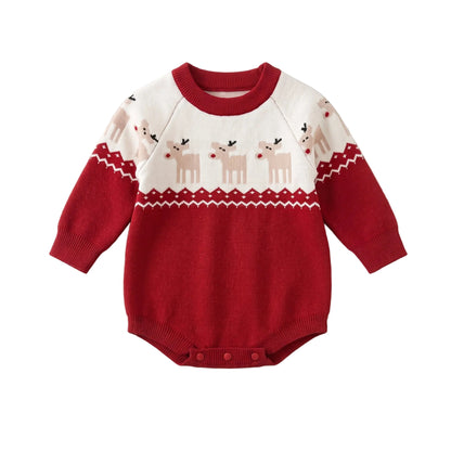 Flat lay of a red and white baby Christmas knit romper featuring a reindeer pattern and long sleeves.