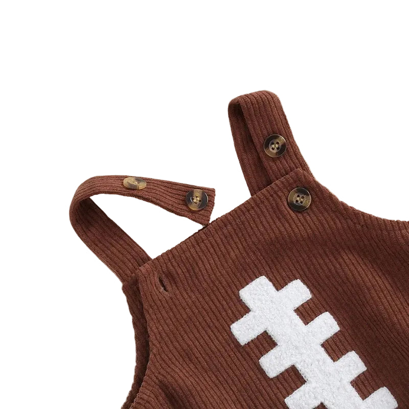 Side detail view of white embroidered football laces on brown corduroy baby overall romper
