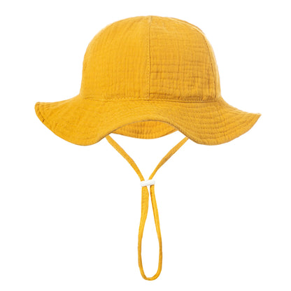Bright gold or mustard yellow ultralight cotton baby sun hat with chin strap.