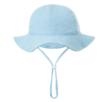 Light blue cotton wide brim bucket hat for baby summer sun protection.