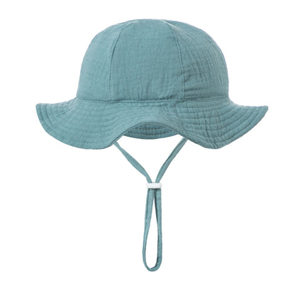 Teal green breathable muslin cotton wide brim sun hat for toddlers.