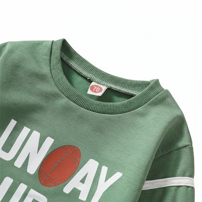 Detailed view of the flexible ribbed crew neck collar and inner neckline stitching on the sage green baby pullover.